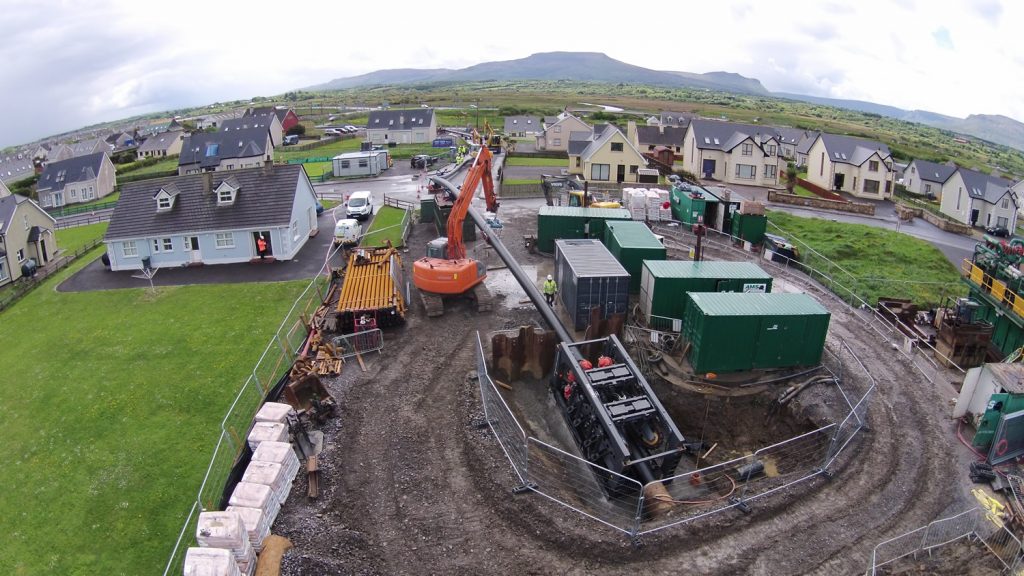 Pipe pusher in position and pipe installation in progress